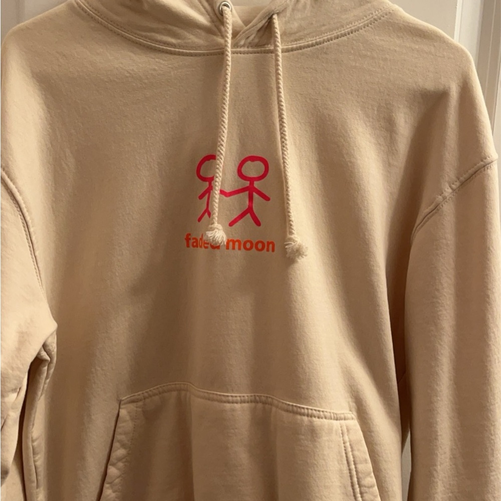 Faded moon sweatshirt. It’s not a super oversized fit more true to a medium.